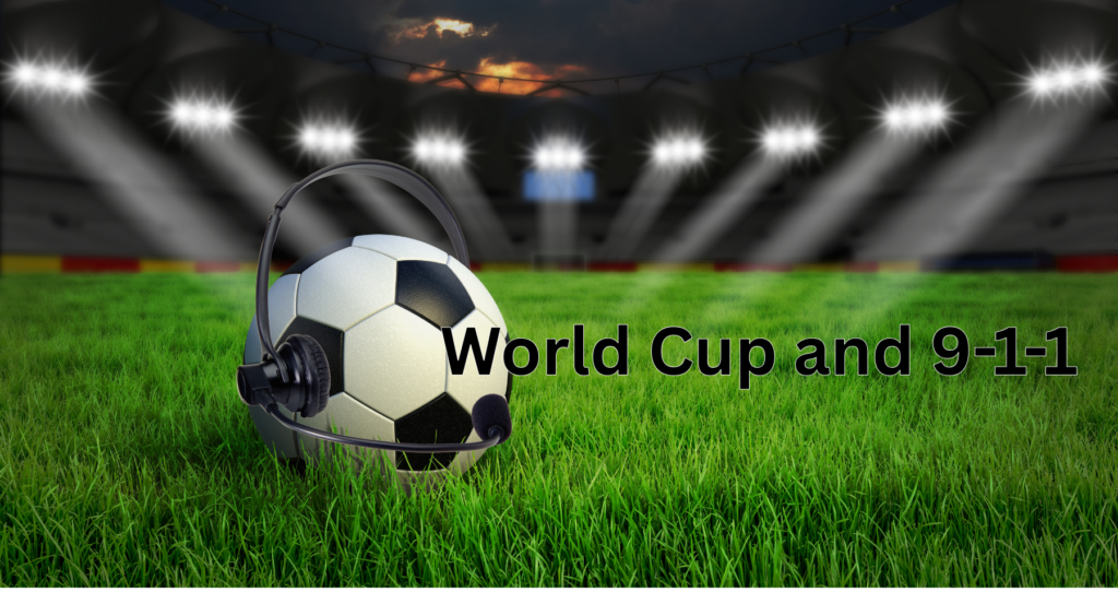A soccer ball on a field of green grass with the text "Word Cup and 9-1-1"
